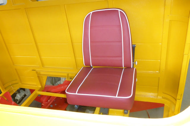 The old driver's seat newly upholstered